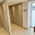 Prora - Modernes Apartment mit Meerblick, Balkon und Gemeinschaftssauna - Düne 18 Apartment *